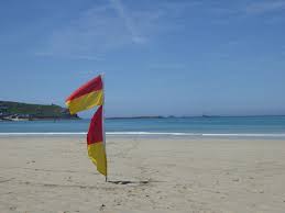 A beach flag, mint reklámfelület